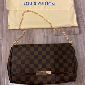 Brand new checkered pochette bag